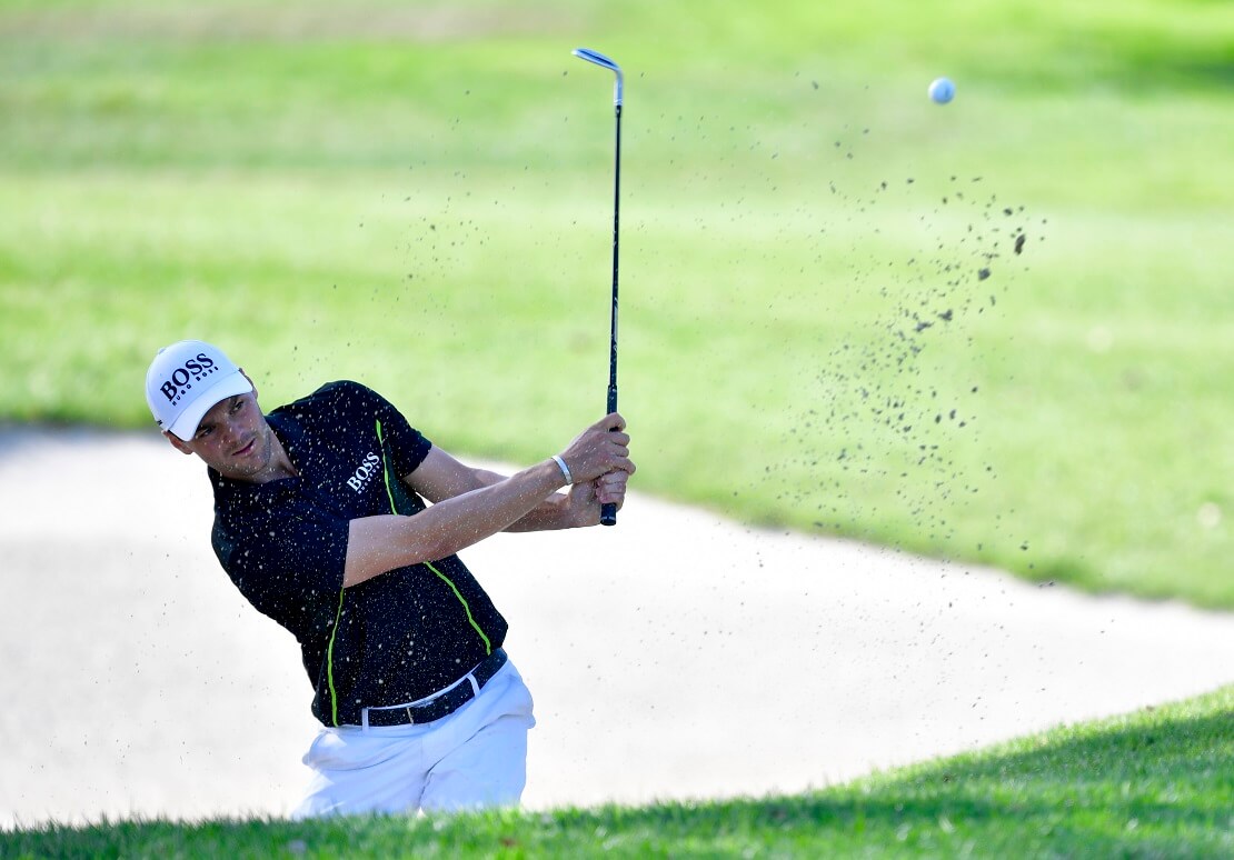 Martin Kaymer schlägt einen Ball aus einem Sankbunker