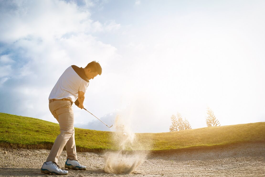 Golfspieler im Bunker