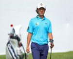 Der Golfer Kris Kim mit seinem Putter